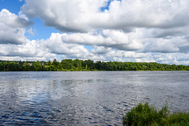 istock colorful clouds over the summer lake 835545982