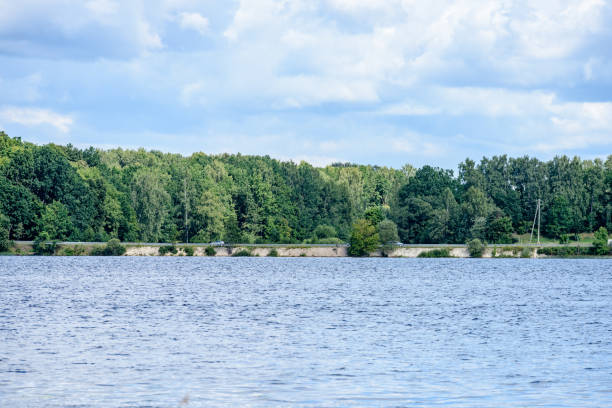 istock colorful clouds over the summer lake 835545990