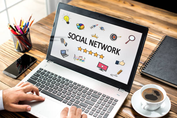 istock Social Network Concept On Work Desk With Various Doodle Icons 835580188