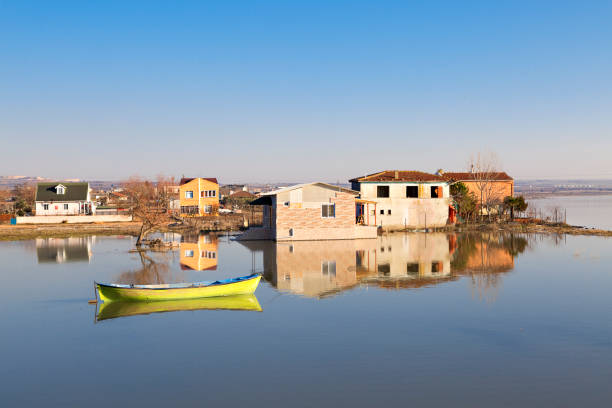 Houses and reflections in the town of Manyas, Bandirma, Turkey.