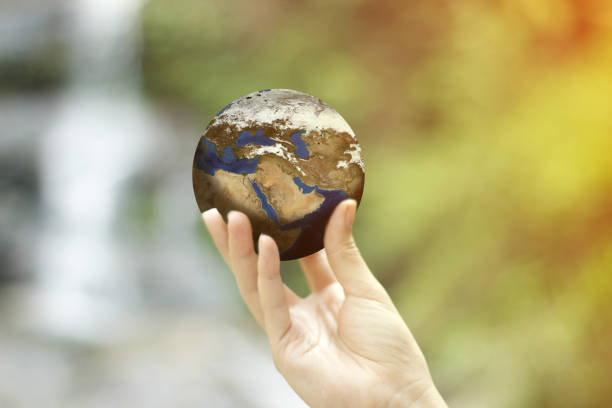istock hand holding globe saving the world and earth concept 835595696