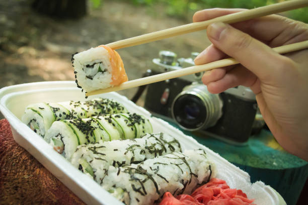istock Picnic. Sushi outdoors on a summer day 835609938