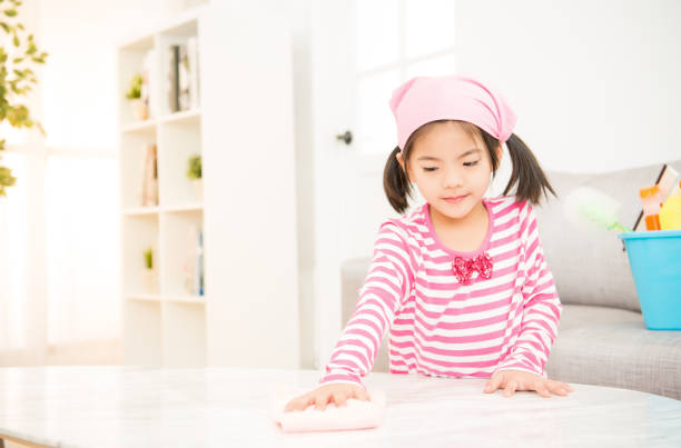 istock happy little girl learning cleaning 835619092