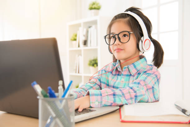 istock asian chinese schoolgirl study with computer 835621636