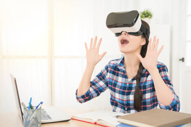 istock shocked woman enjoying virtual reality 835626694