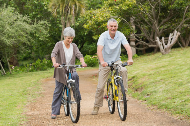 istock Senior couple on cycle ride in countryside 835629446