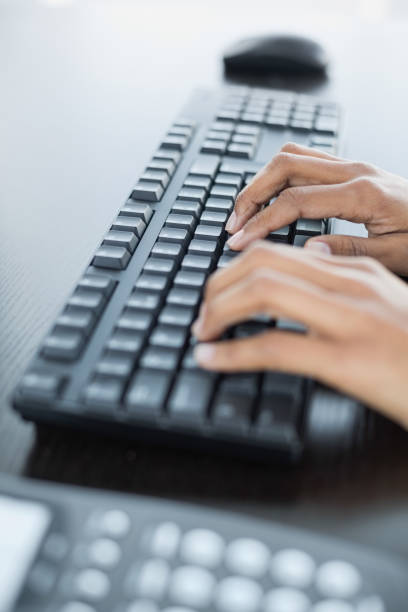 istock Close up of female hands typing on keyboard 835635114