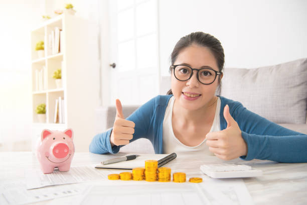 istock woman showing thumbs up after counting 835635330