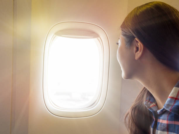 istock traveler in the airplane 835640396