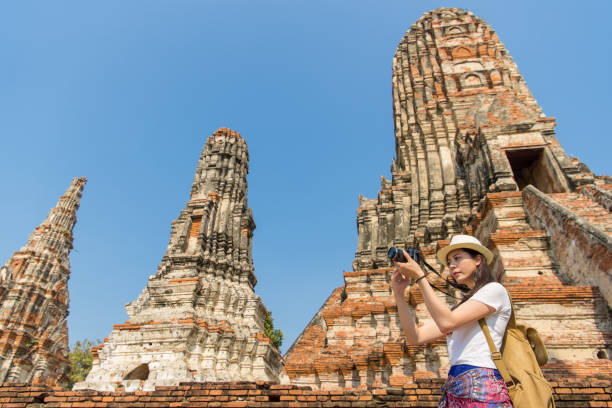 istock Young asian woman taking pictures 835641794