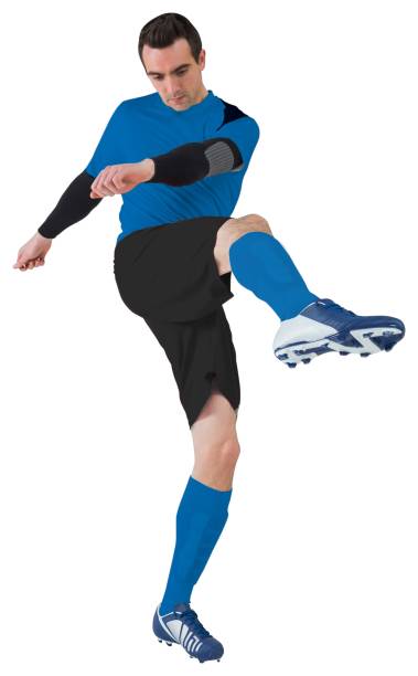 istock Football player in blue kicking 835646398