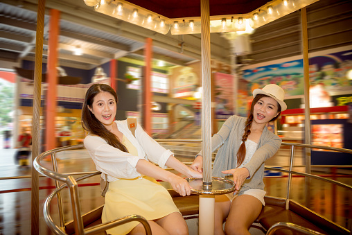 asian chinese students going to the amusement park