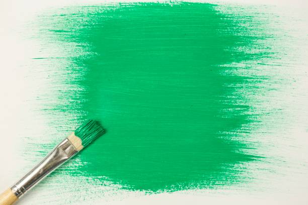 istock Green paint with paintbrush 835649658