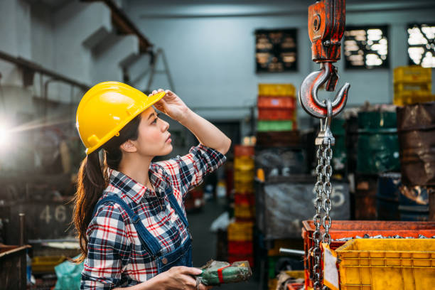 istock components factory female staff hold helmet 835676806