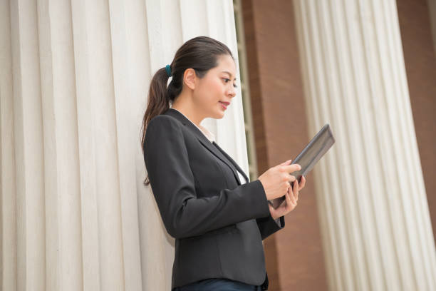 istock business manager reading the legal information 835677272