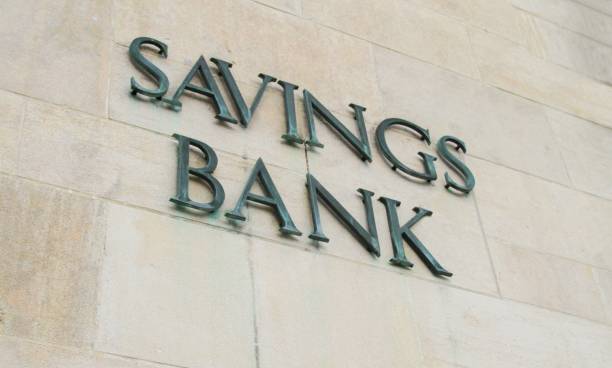 istock Savings bank sign on wall 835683610