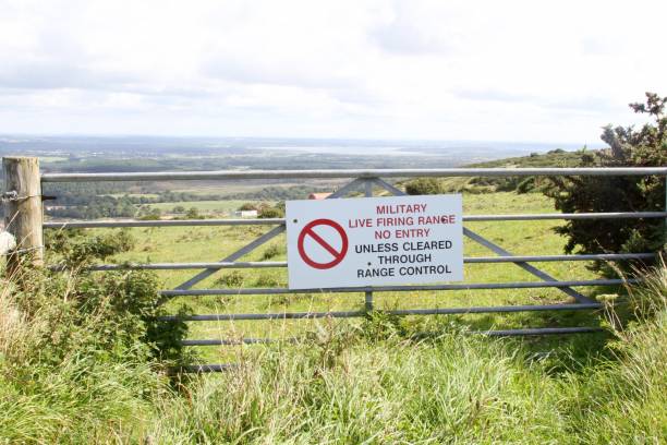 istock warning sign for military firing range in countryside 835684062