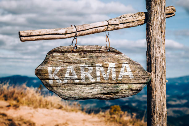 Karma Karma text on a wooden sign board. kurma stock pictures, royalty-free photos & images