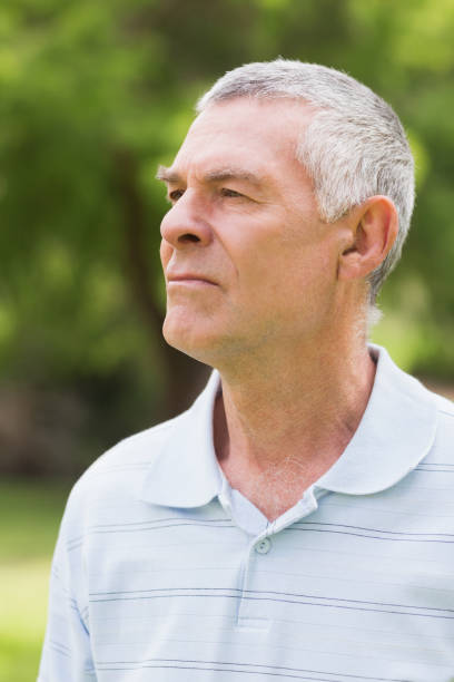istock Closeup of a serious senior man at park 835703302