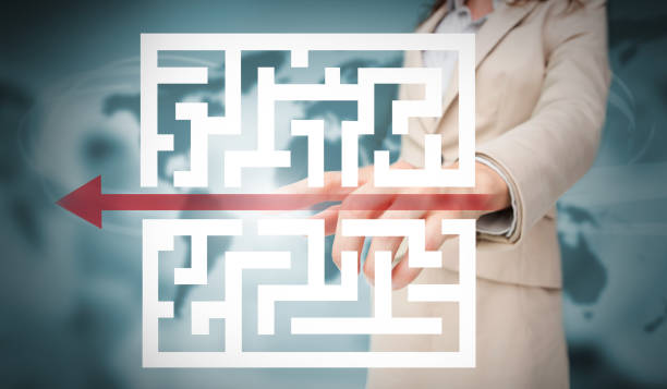 istock Businesswoman tracing red arrow through qr code 835717004