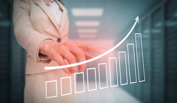 istock Businesswoman touching bar chart and arrow graphic 835717018