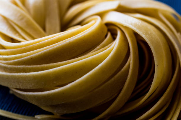Raw Tagliatelle / Uncooked Pasta or Spaghetti.