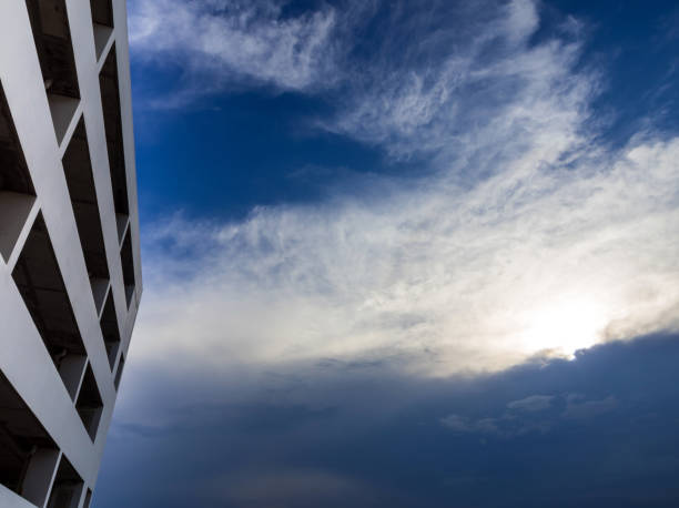 istock Car park building and dark sky 835729550