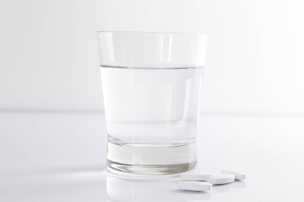istock water and medicine pills 835729882