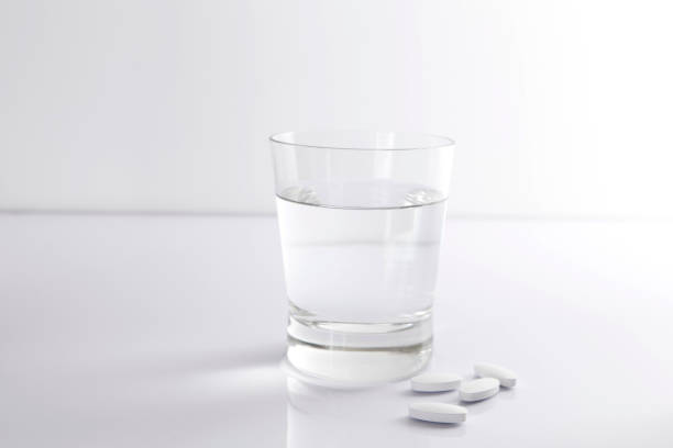 istock water and medicine pills 835729884