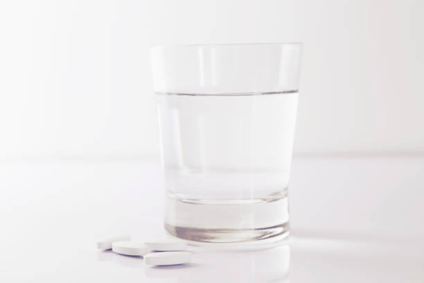 istock water and medicine pills 835729886
