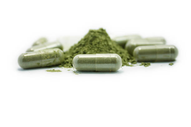 Close up andrographis paniculata herbal antipyretic capsules isolated on white background