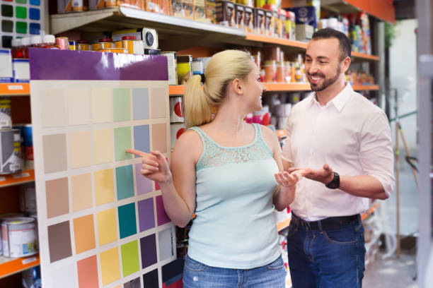 istock Couple choosing color in household store 835732926