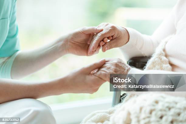 Nurse Holding Patients Hands Stock Photo - Download Image Now - Home Caregiver, Hospice, Care