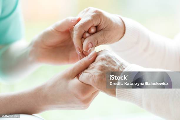 Closeup Of Holding Hands Stock Photo - Download Image Now - Parkinson's Disease, Senior Adult, Hand