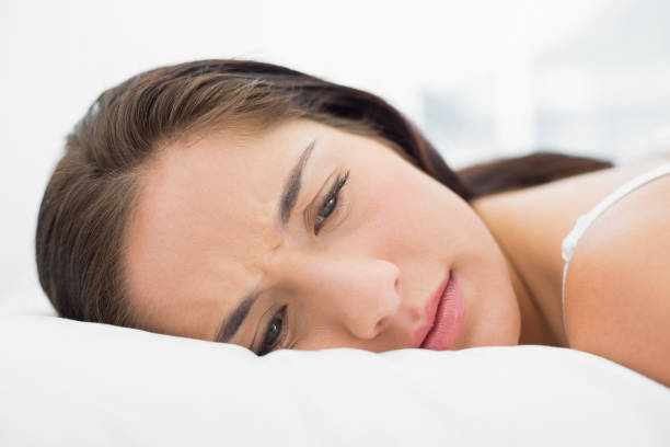 istock Pretty young woman resting in bed 835733258