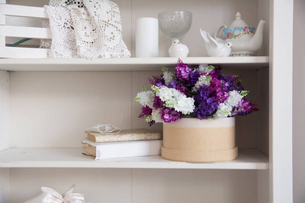 Bouquet of flowers in a box and a book