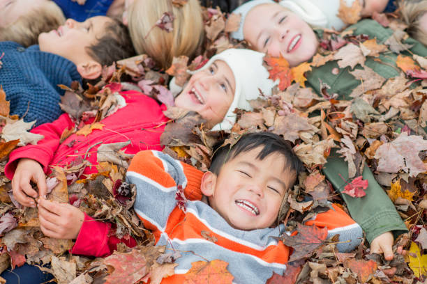 istock Children In Leaves 835736102