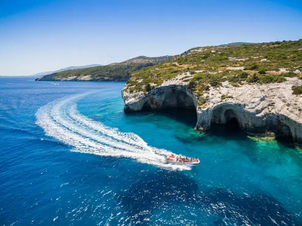 Photo of Aerial  view of  Agios Nikolaos blue caves  in Zakynthos (Zante) island, in Greece