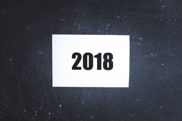 istock New year 2018 paper on blackboard 835743080