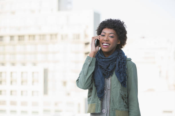istock Smiling casual model on the phone 835746210