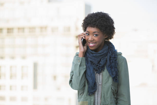 istock Cheerful afro model on the phone 835746242