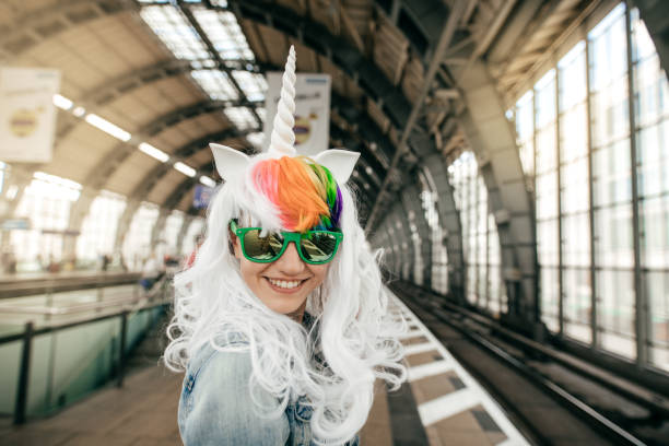Ready for Halloween Unicorn lady at train station katt halloween stock pictures, royalty-free photos & images