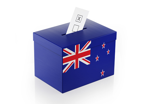 Ballot box textured with New Zealand flag. Isolated on white background. A vote envelope is entering into the ballot box. Horizontal composition with copy space. Great use for referendum and presidential elections related concepts. Clipping path is included.
