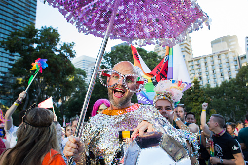 A parade entrant poses for the camera in the marshalling area in Hyde Park at the 2016 Sydney Gay & Lesbian Mardi Gras.