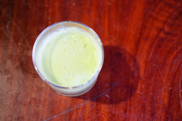 istock Juicer prepares fresh and healthy juice in glass 835764400