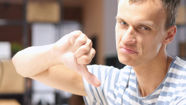 istock Failure in Project, Poor Results, Thumbs Down Gesture, Portrait 835765892