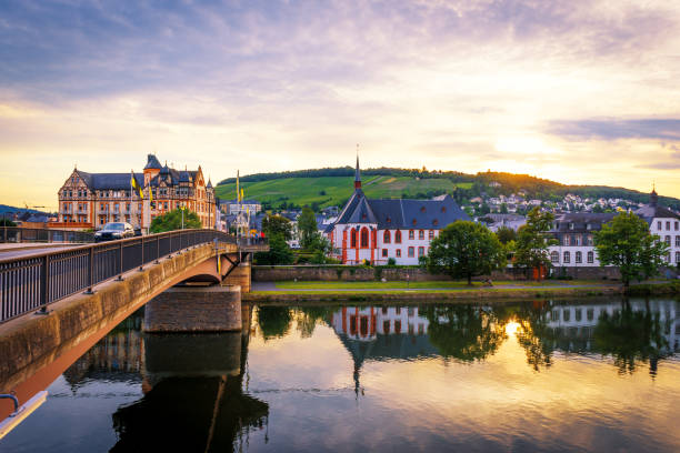 istock small town near river in europe 835769838
