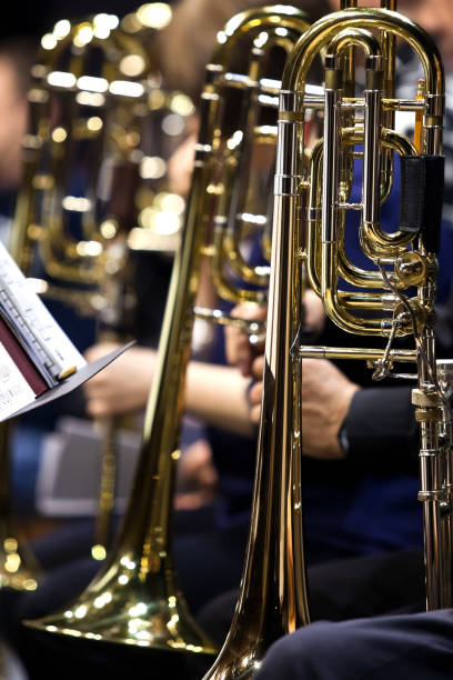 istock Trombones in the hands of musicians in the orchestra 835772486