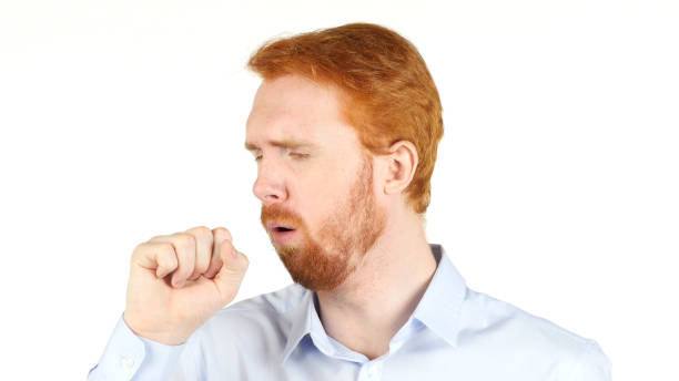 istock Red Hair man coughing on white background 835776524