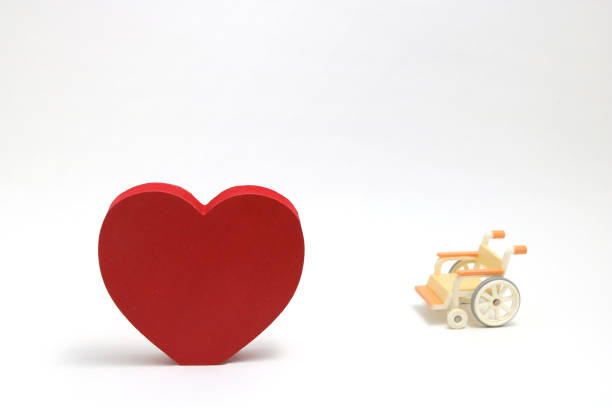 istock Heart shape and wheelchair on white background. 835776526